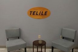 Station lobby with the Telile sign and chairs