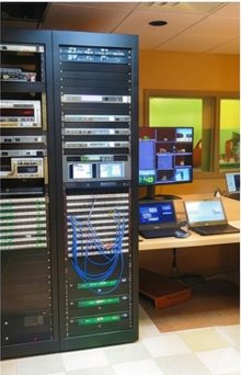 Broadcast equipment rack with monitors